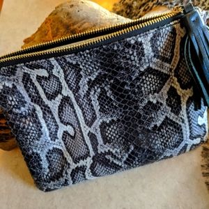 Post faux snakeskin clutch